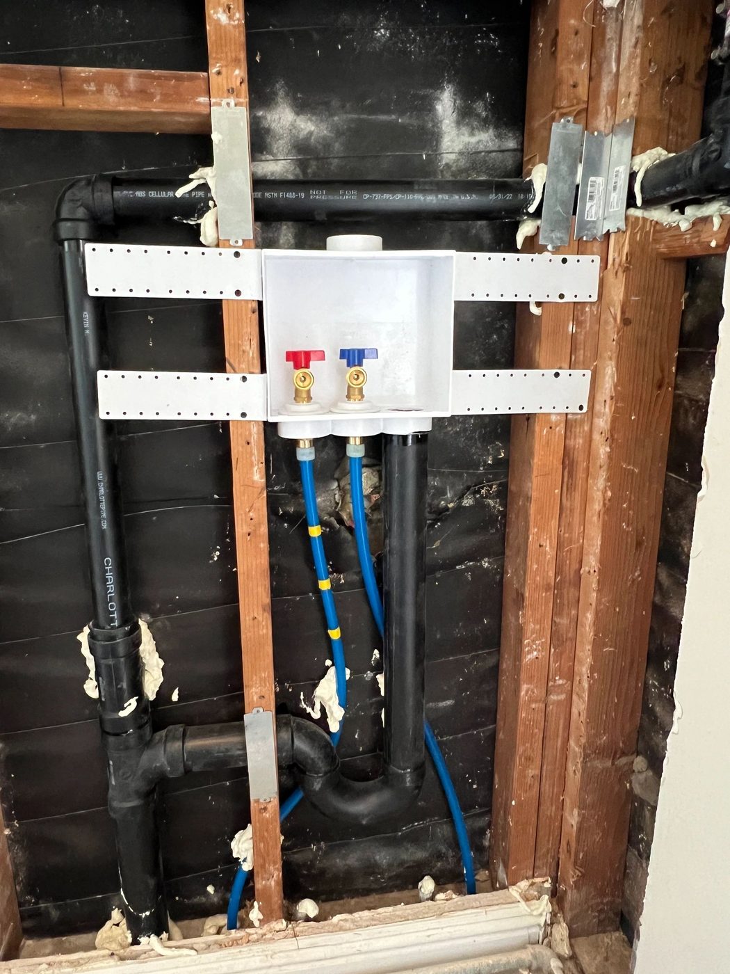 Washing machine box repipe rough-in with PEX